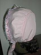 Baby style bonnet has elastic along center back.